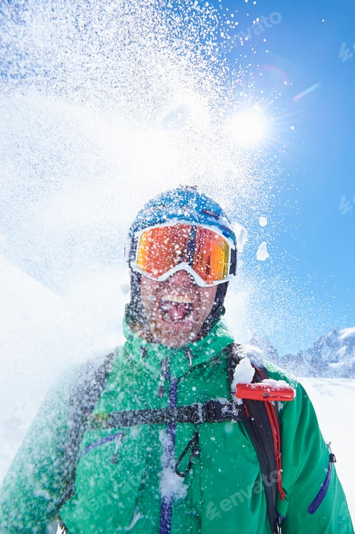 Preview: Portrait of mature male skier covered in powder snow, Mont Blanc massif, Graian Alps, France