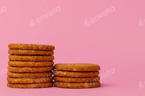 Preview: Stack of round oat cookies on paper background