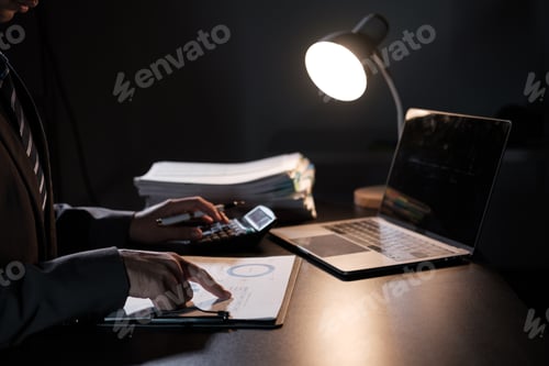 Preview: Business woman working in finance and accounting Analyze financial budget in the office