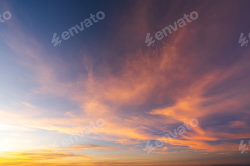 Preview: Beautiful dramatic and colorful sky at sunset over the mountains