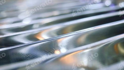 Preview: Close-up of metal grid of generator. Media. Lines of steel grid in generator coil. Metal grating