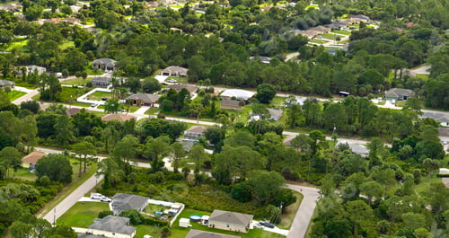 Preview: Aerial view of small town America suburban landscape with private homes
