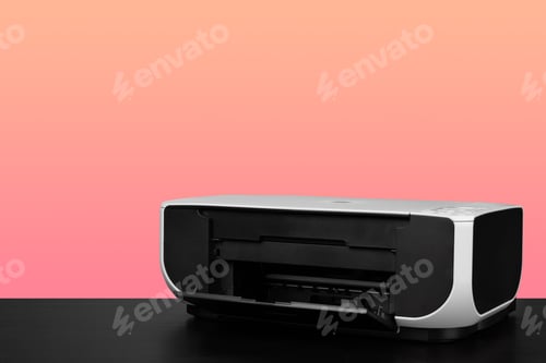 Preview: Compact home laser printer against pink background