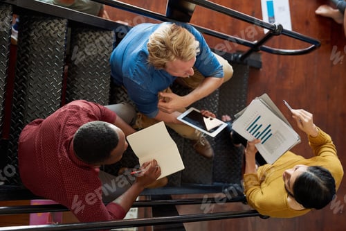 Preview: Shot of a group of creative workers having a brainstorming session in an office