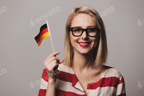 Preview: beatiful girl holds German flag