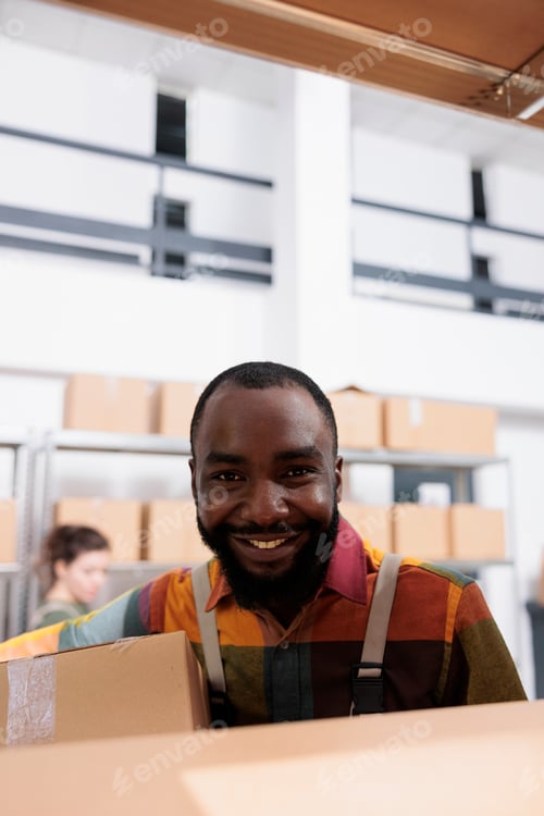 Preview: Smiling african american manager working at customers order