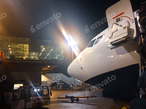 Preview: Airplane at the airport terminal runway