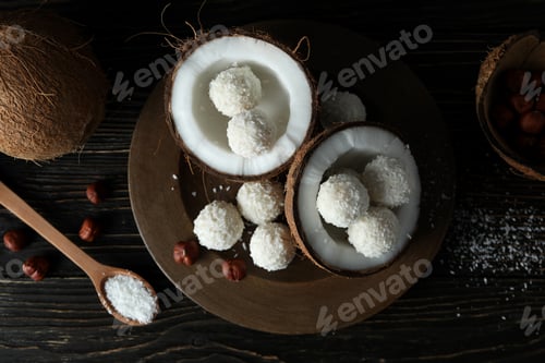 Preview: Concept of tasty sweets, coconut candies, top view