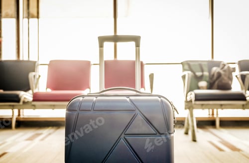 Preview: Close up Suitcases in airport departure terminal with terminal
