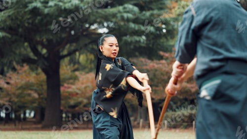 Preview: People, fight or sword in park for martial arts, demonstration or fitness in Kyoto. Japanese kendo,