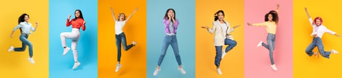 Preview: Diverse Overjoyed Women Jumping In Air Against Colorful Studio Backgrounds