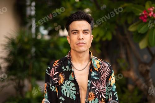 Preview: Portrait of handsome young cool man outdoors