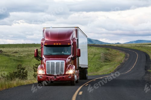 Preview: truck on a highway through the grasslands area of eastern Washington, USA.