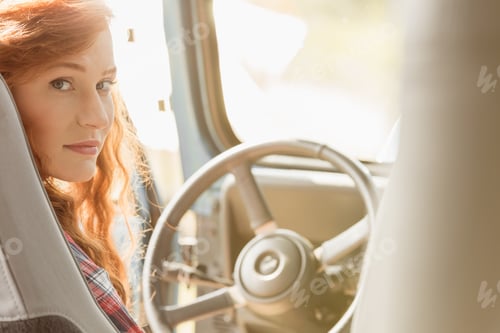 Preview: Young woman driving car