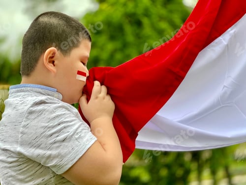 Preview: Smiling Child Holding a Red and White Flag