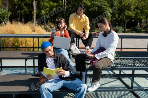Preview: Young friends sharing laughter and creativity in a vibrant outdoor setting during sunny afternoons