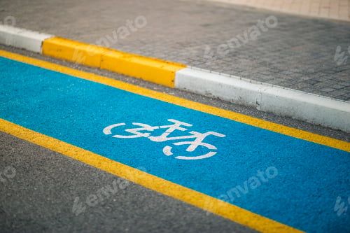 Preview: Empty blue bike road with bike sign on the ground