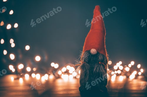 Preview: Winter Gnome with Christmas lights. Holiday concept
