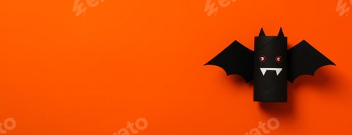 Preview: Bat paper mockup on orange background, space for text