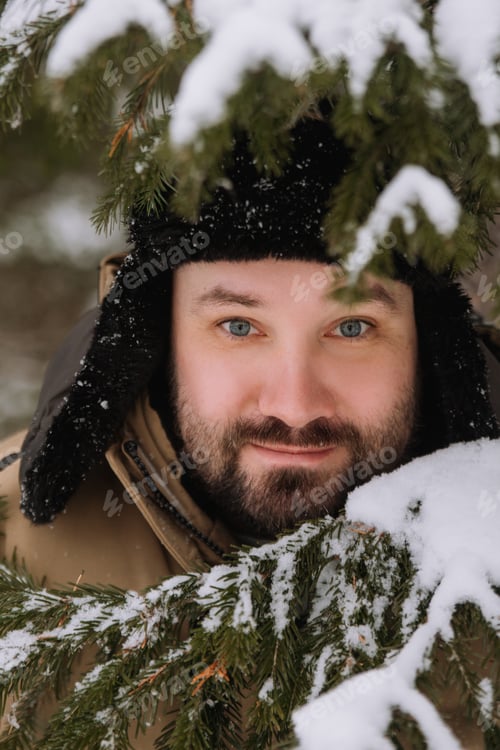 Preview: Bearded man in winter forest