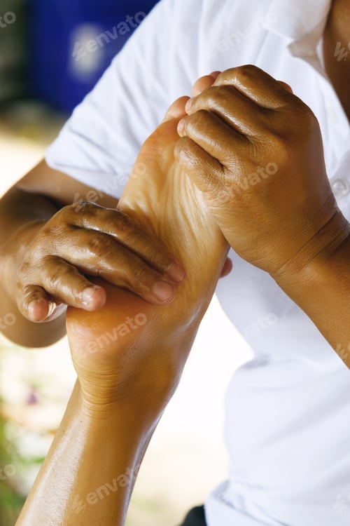 Preview: Closeup of female feet during traditional Thai massage