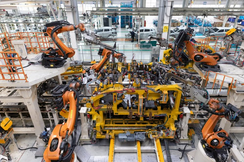Preview: Car bodies are on assembly line. Factory for production of cars. Modern automotive industry. Top