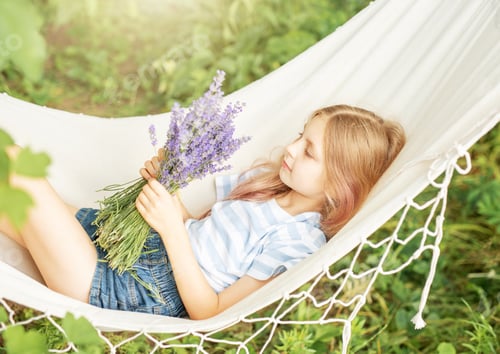 Preview: Girl Relaxing in Hammock with Lavender Bouquet