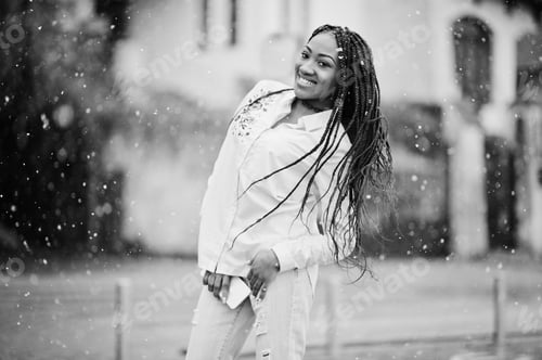 Preview: Stylish african american girl with dreads