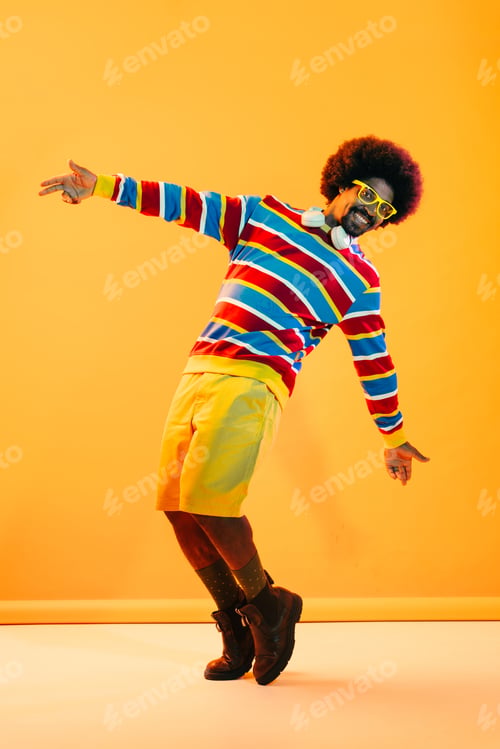 Preview: African man portrait in studio on colorful background