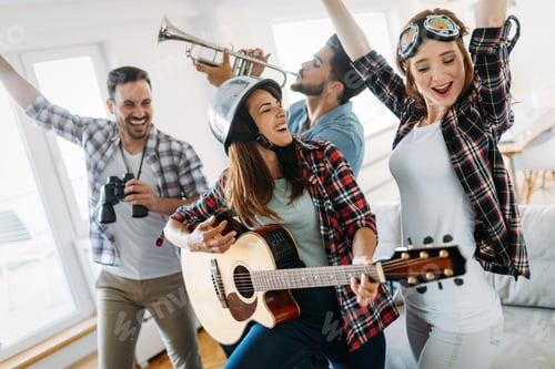 Preview: Cheerful friends having party together and playing instruments