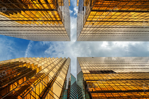 Preview: Uprisen angle of Hong Kong skyscraper with reflection of clouds among high building