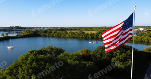 Preview: American flag on the flagpole waving in the wind