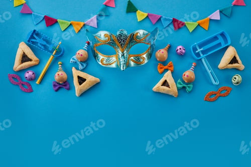 Preview: Purim celebration concept. Jewish carnival background. hamantaschen or hamans ears cookies, carnival