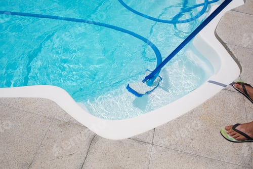 Preview: cleaning pool with vacuum cleaner. Cleaning equipment for small pools.