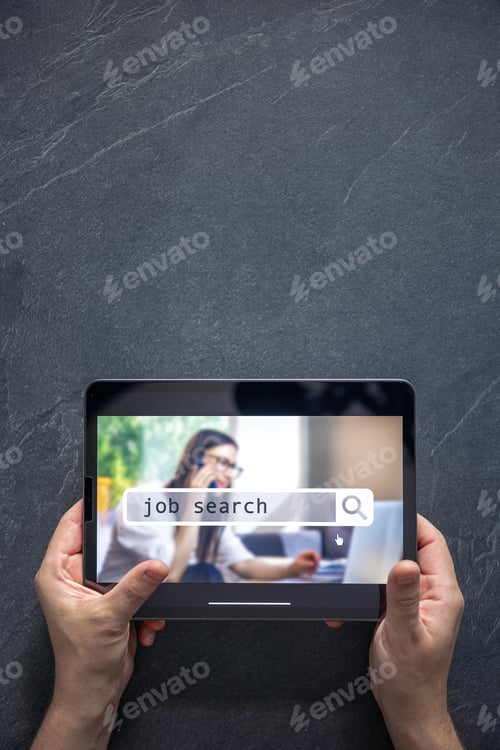 Preview: Top view of digital tablet with search job on screen in male hands.