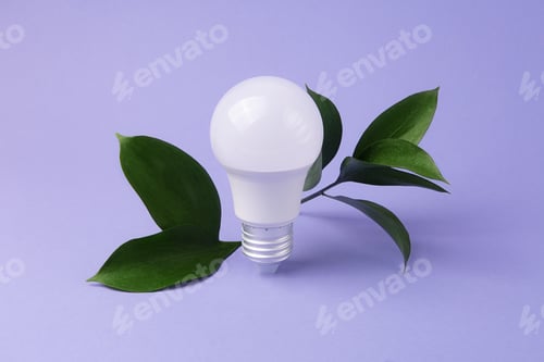 Preview: Led bulb with fresh green leafs,green energy concept.