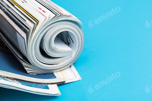 Preview: Glossy magazine with pages rolled
