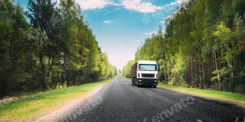 Preview: Truck, Tractor Unit, Prime Mover, Traction Unit In Motion On Country Road Through Forest, Freeway