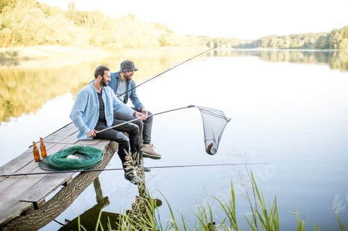 Preview: Men catching fish on the lake