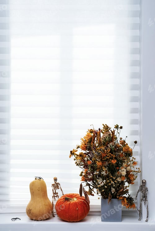 Preview: Halloween Pumpkins, Skeletons and Spiders on the Windowsill. Halloween Decoration at Home.