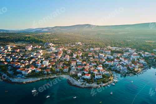 Preview: Aerial view of Adriatic sea coastline with coastal village along shoreline