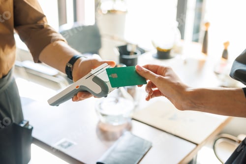 Preview: NFC credit card payment. Woman paying with contactless credit card with NFC
