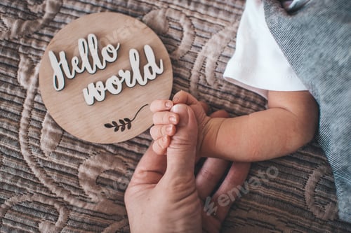 Preview: hands of mom and baby