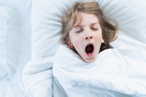 Preview: Little snoring girl, sleeping on pillow in bed with closed eyes. Evening late going to bed. Bedtime