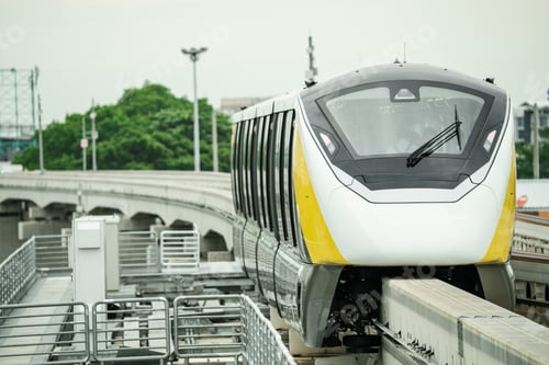 Preview: Elevated monorail train on rail. Public transit monorail. Modern mass transit. Electric vehicles.