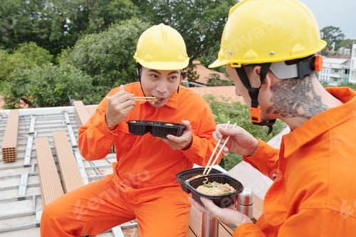 Preview: Builders Eating Lunch at Construction Site