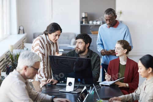 Preview: Diverse Team of Business People Working in Office