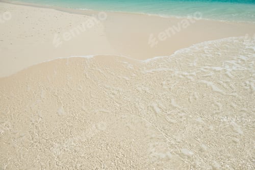 Preview: sandy beach and clear transparent sea wave