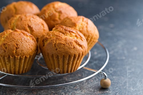 Preview: sweet muffins on kitchen table