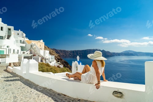 Preview: Woman on holidays in Santorini island